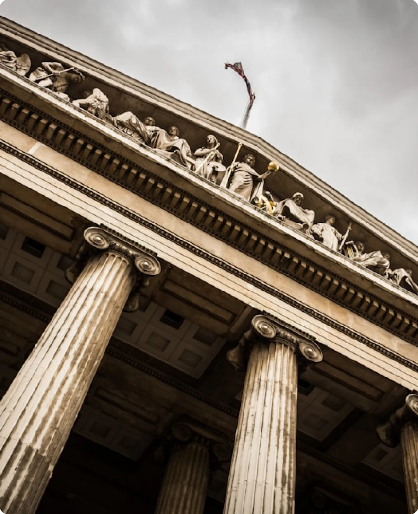 Classical building with columns and statues.